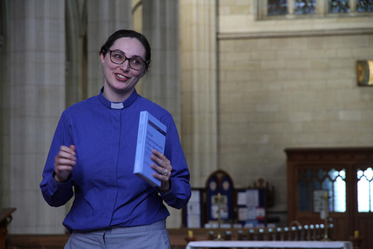 Rev Dr Katie Marcar introduces her study of 1 Peter at her book launch in the sanctuary of St Paul's Cathedral Dunedin.