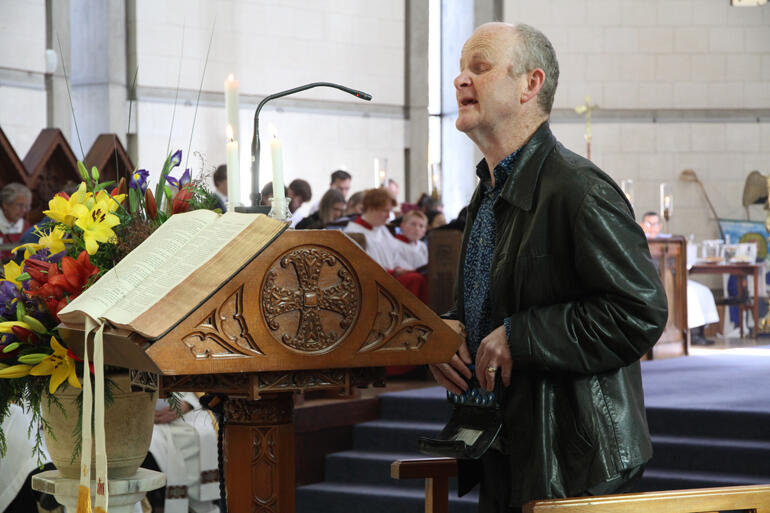 Mark Wilson, organist from St Peter's Wakatipu reads the first lesson using his digital Braille device. Mark Wilson, organist from St Peter's Wakatipu reads the first lesson using his digital Braille device.