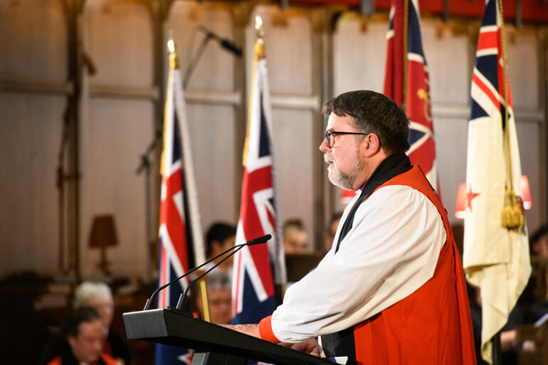 Archbishop Philip Richardson offers the bidding prayers.