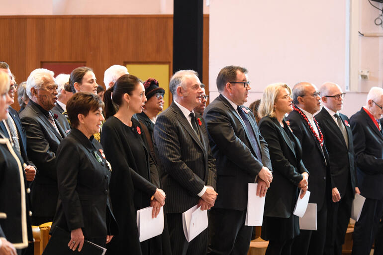 Governor General Patsy Reddy and Prime Minister Jacinda Ardern head up a line of Government ministers and dignitaries.