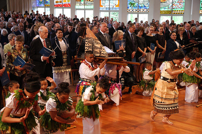 The gospel vaka arrives at the front of the cathedral. The gospel vaka arrives at the front of the cathedral.