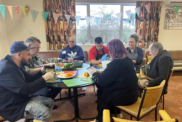Messy Cooking members prepare a traditional evening meal at St Paul's Putaruru.