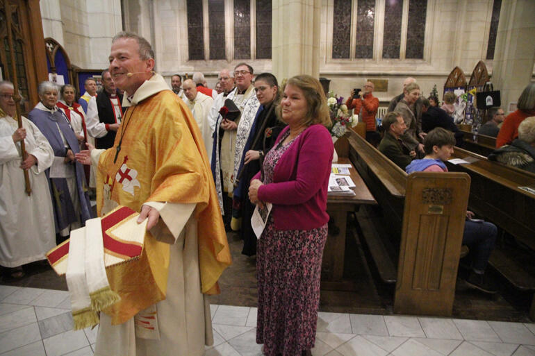 Bishop Steven prays with the sanctuary team at the end of his farewell service. Bishop Steven prays with the sanctuary team at the end of his farewell service.