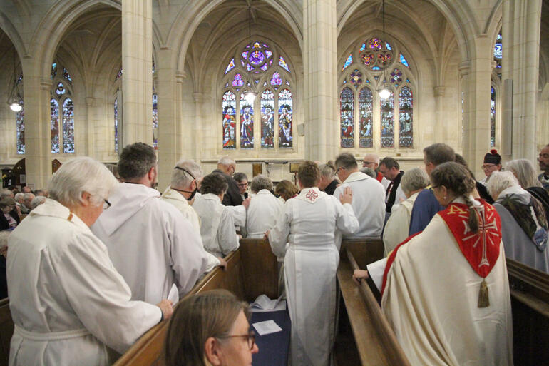 Rev Esther Clarke-Prebble leads prayers for Bishop Steven and Lorraine in St Paul's Cathedral nave. Rev Esther Clarke-Prebble leads prayers for Bishop Steven and Lorraine in St Paul's Cathedral nave.