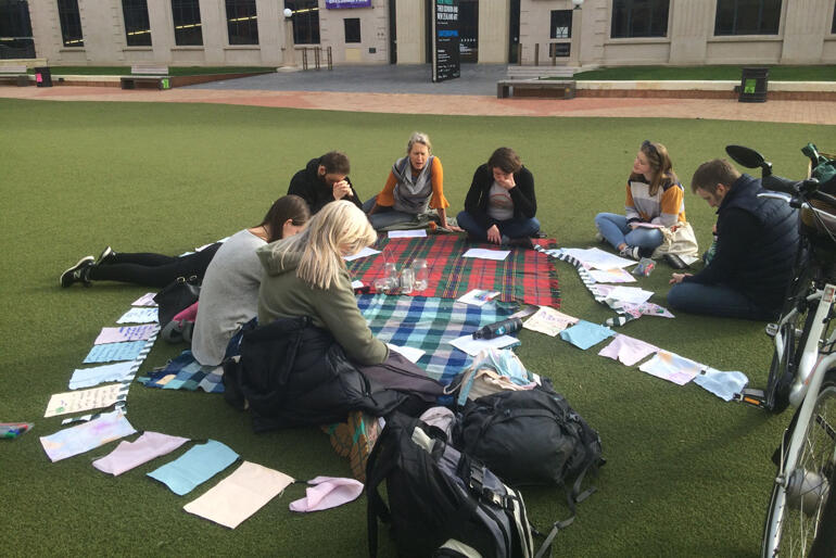 A group of Wellington Anglicans pray at Civic Square before the crowds arrive for the climate strike. A group of Wellington Anglicans pray at Civic Square before the crowds arrive for the climate strike.