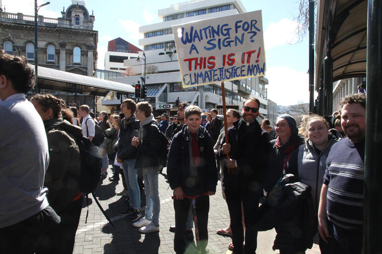 Dunedin North parishioners join the climate strike: L-R: Finlay C-W, Rev Michael Wallace, Ruahina Scott-Fyfe, Aleshia Lawson, John Graveston. 