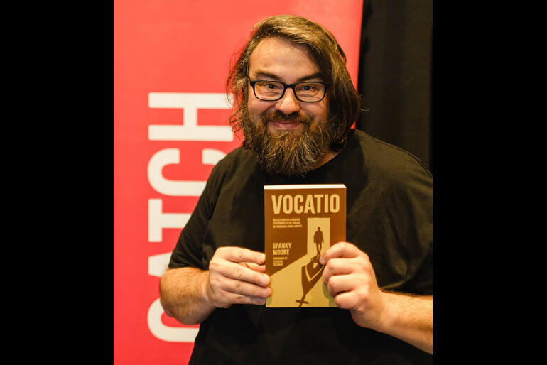Rev Spanky Moore clutches his recently published book on "Vocatio" a monastic community made up of jaded 20s-30s on a new discipleship journey. Rev Spanky Moore clutches his recently published book on "Vocatio" a monastic community made up of jaded 20s-30s on a new discipleship journey.