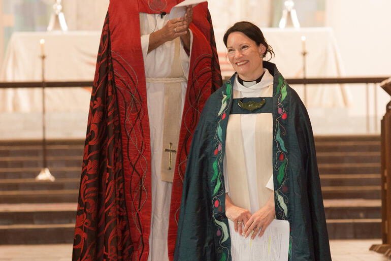 Dean of Wellington the Very Reverend Katie Lawrence smiles as the Cathedral community welcomes her to the role. Dean of Wellington the Very Reverend Katie Lawrence smiles as the Cathedral community welcomes her to the role.