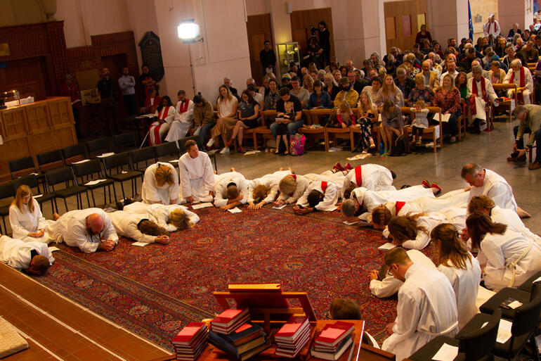 Ordinands wait on the Holy Spirit before their ordinations. 