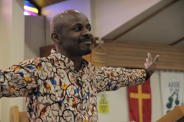 Bishop Steve Maina gestures the open welcome we have to offer people seeking truth and life. Bishop Steve Maina gestures the open welcome we have to offer people seeking truth and life.