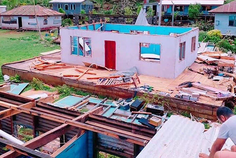 Many buildings under repair or reconstruction after Cyclone Yasa lost roofs or walls in Cyclone Ana.