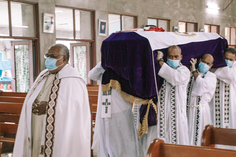 Archbishop Fereimi enters Holy Trinity Cathedral borne aloft by priests of the Diocese of Polynesia.