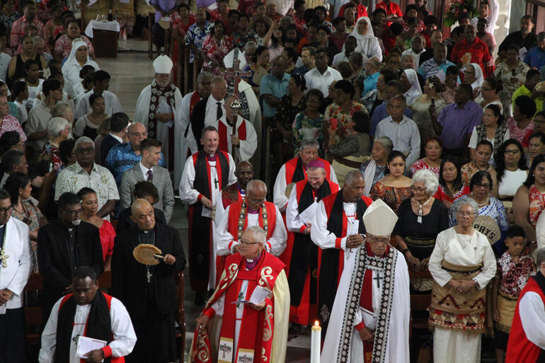Bishops Richard Wallace and Ngarahu Katene reach the sanctuary during the opening procession. Bishops Richard Wallace and Ngarahu Katene reach the sanctuary during the opening procession.