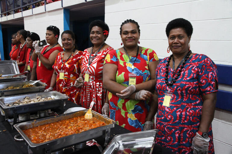 Members of the Diocese of Polynesia food serving team provide the ordination festival lunch.