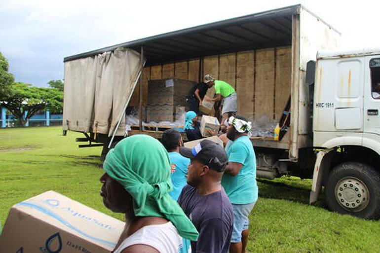 Diocese of Polynesia teams in Suva load relief items into containers for shipping to Tonga in early February. Diocese of Polynesia teams in Suva load relief items into containers for shipping to Tonga in early February.
