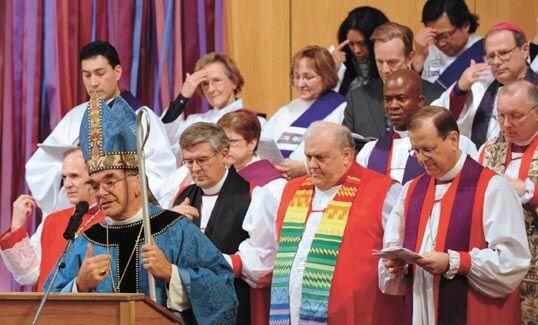Bishop Bob Duncan with members of his new North American flock. Picture: Church Times. Bishop Bob Duncan with members of his new North American flock. Picture: Church Times.