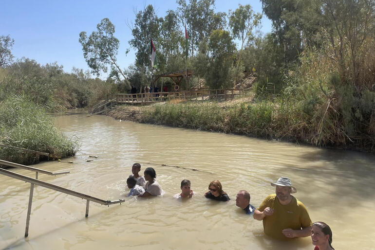 Ordinands joining a St George's ministry formation pilgrimage visit the site of Jesus' baptism in the River Jordan.
